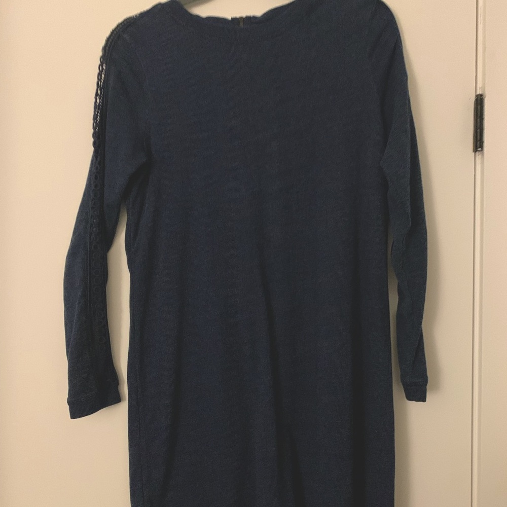 Navy blue dress with knit detail along the sleeves.